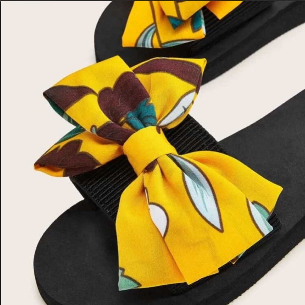 FREE W/$25 Purchase New! Yellow Bow Slides - Picture 2 of 2